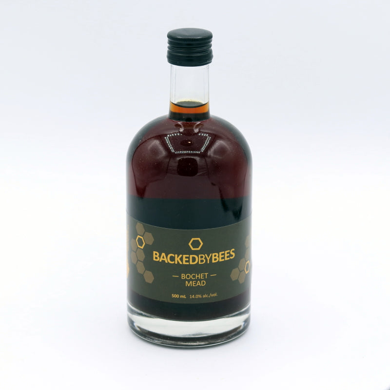 Bottle of BackedByBees Bochet Mead on a white background