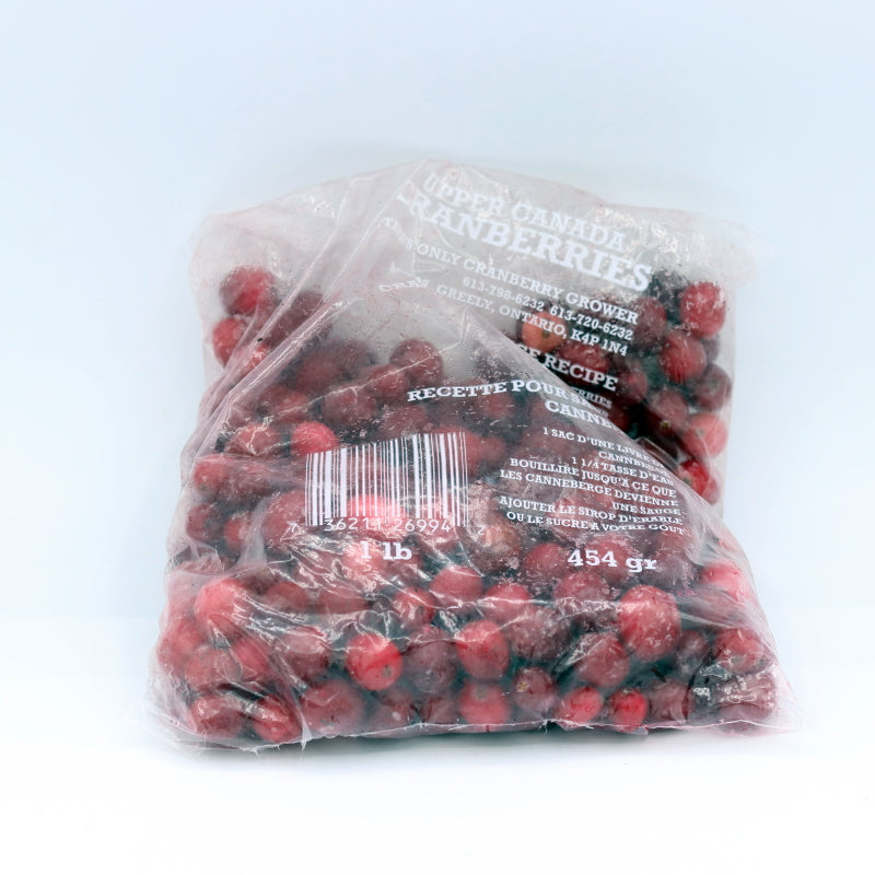 Bag of cranberries with a label on a white background